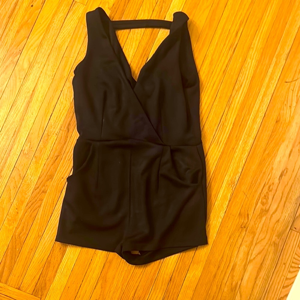 Free People Black Jumpsuit with Plunging V-Neck and Defined Waist